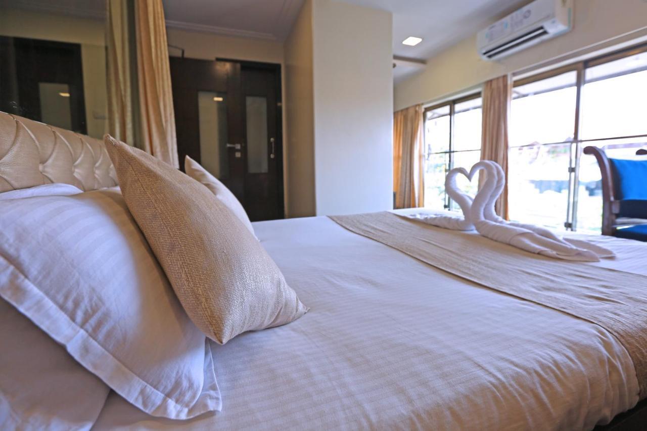 Gulf Hotel Bombaim Quarto foto